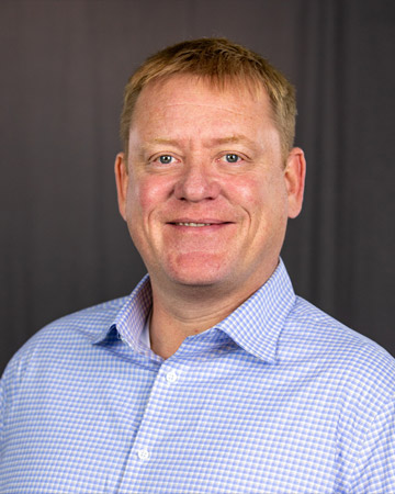 a man in a blue shirt