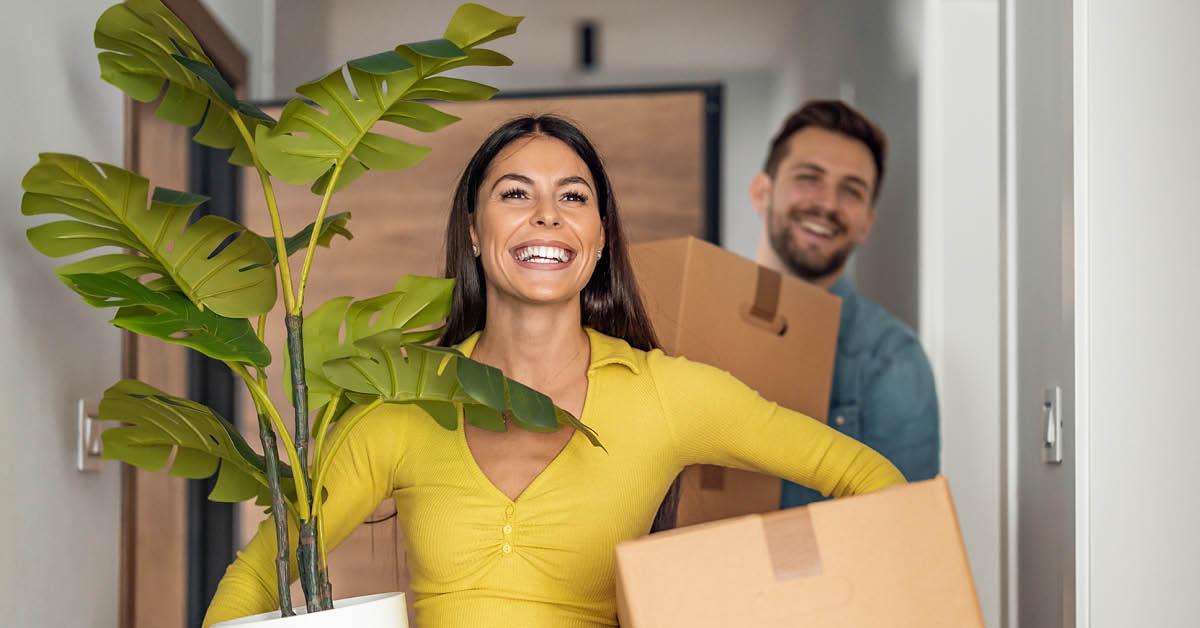 a man and a woman smiling